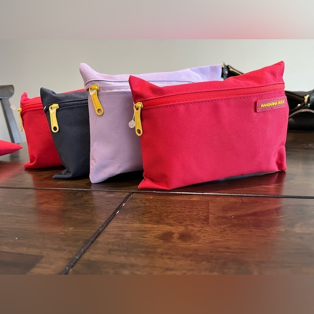 Mandarina Duck inflight travel sets for 4